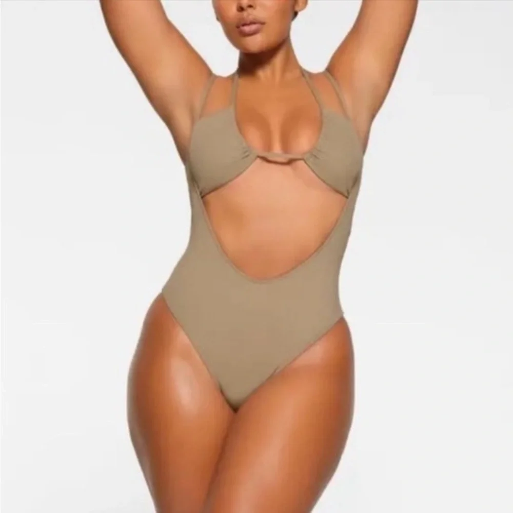 Skims swim cut out open bust one piece size 4x
